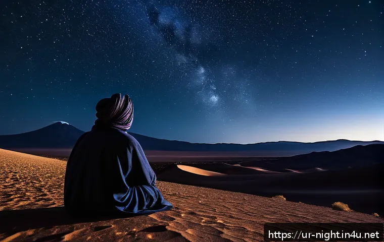 야경과 불꽃놀이 명소 - A serene and spiritual nighttime scene in the Atacama Desert, featuring an expansive clear sky dense...